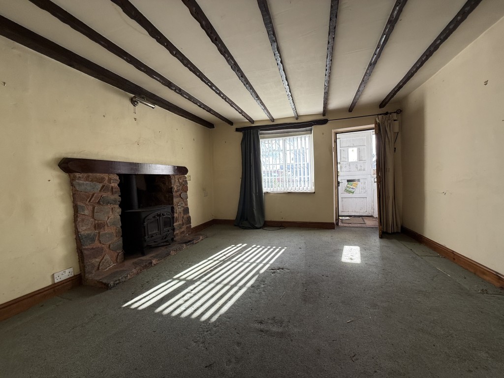 Lot: 26 - TWO-BEDROOM COTTAGE FOR IMPROVEMENT IN POPULAR DEVON VILLAGE - Sitting Room